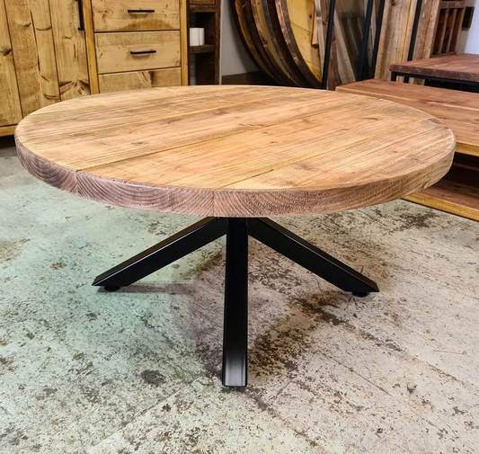 Spider base coffee table with round top