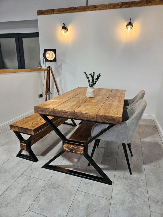 Chunky solid wood dining table in rustic farmhouse dining room