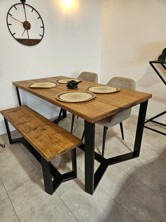Handmade solid oak dining table with black steel legs