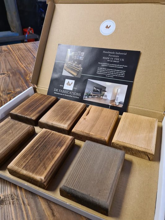 Wooden samples in a box with DK Fabrications branding